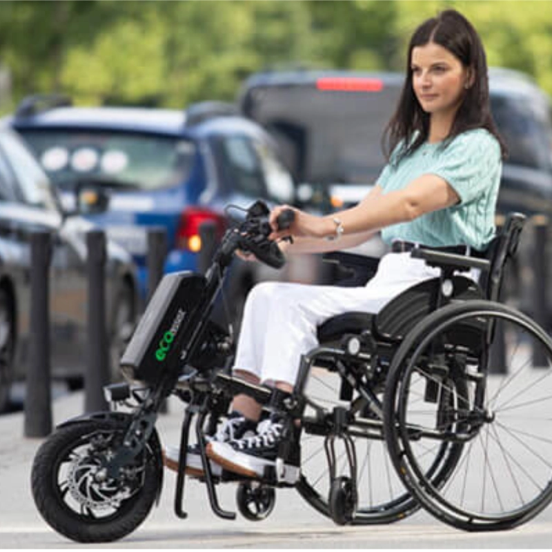 Przystawka elektryczna do wózka Rehasense Eco Assist 12″ – lekka konstrukcja, manualne podłączanie, standardowa kierownica, szerokość ramy 210–480 mm